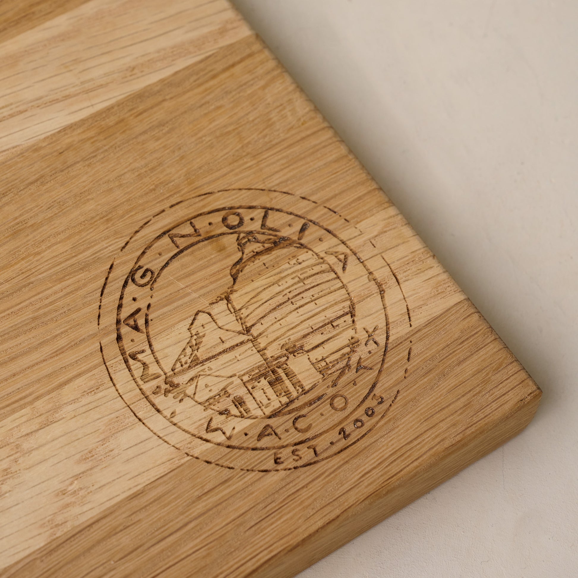 Magnolia Seal Cutting Board close up of silos logo on cutting board