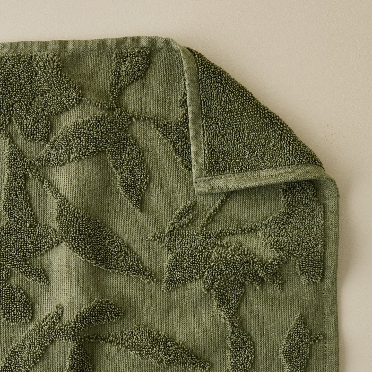 Winter Moss Floral Jacquard Bath Mat corner shown flipped