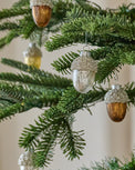 Glass Acorn Ornament, Set of 12 shown hung on tree