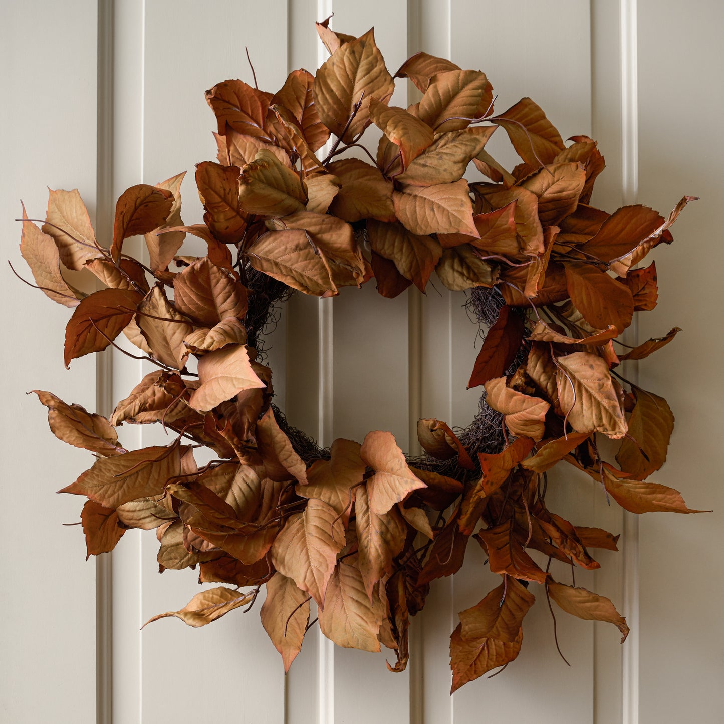 Magnolia Leaf Wreath shown on door