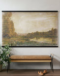 Oversized Vintage Landscape Tapestry hanging above a bench in an entryway