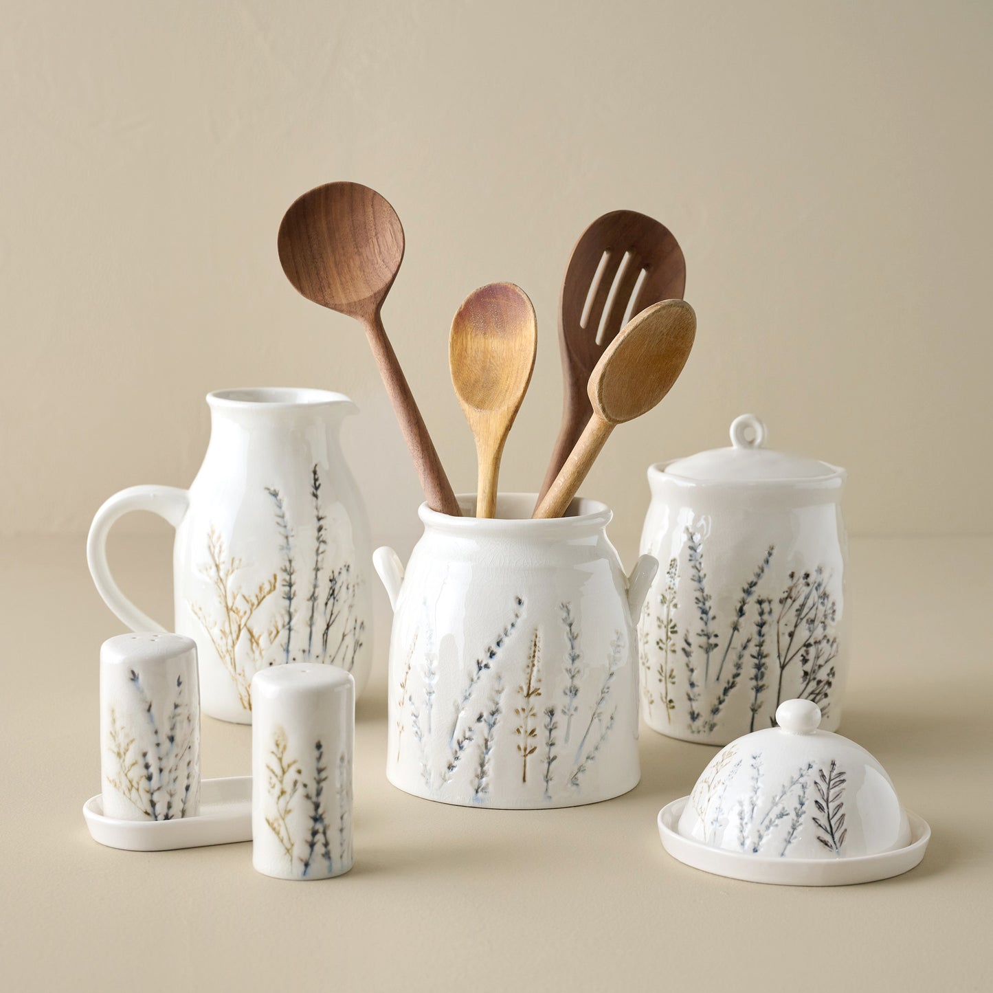 Pressed Floral Ceramic Butter Dish shown with other pressed floral pieces