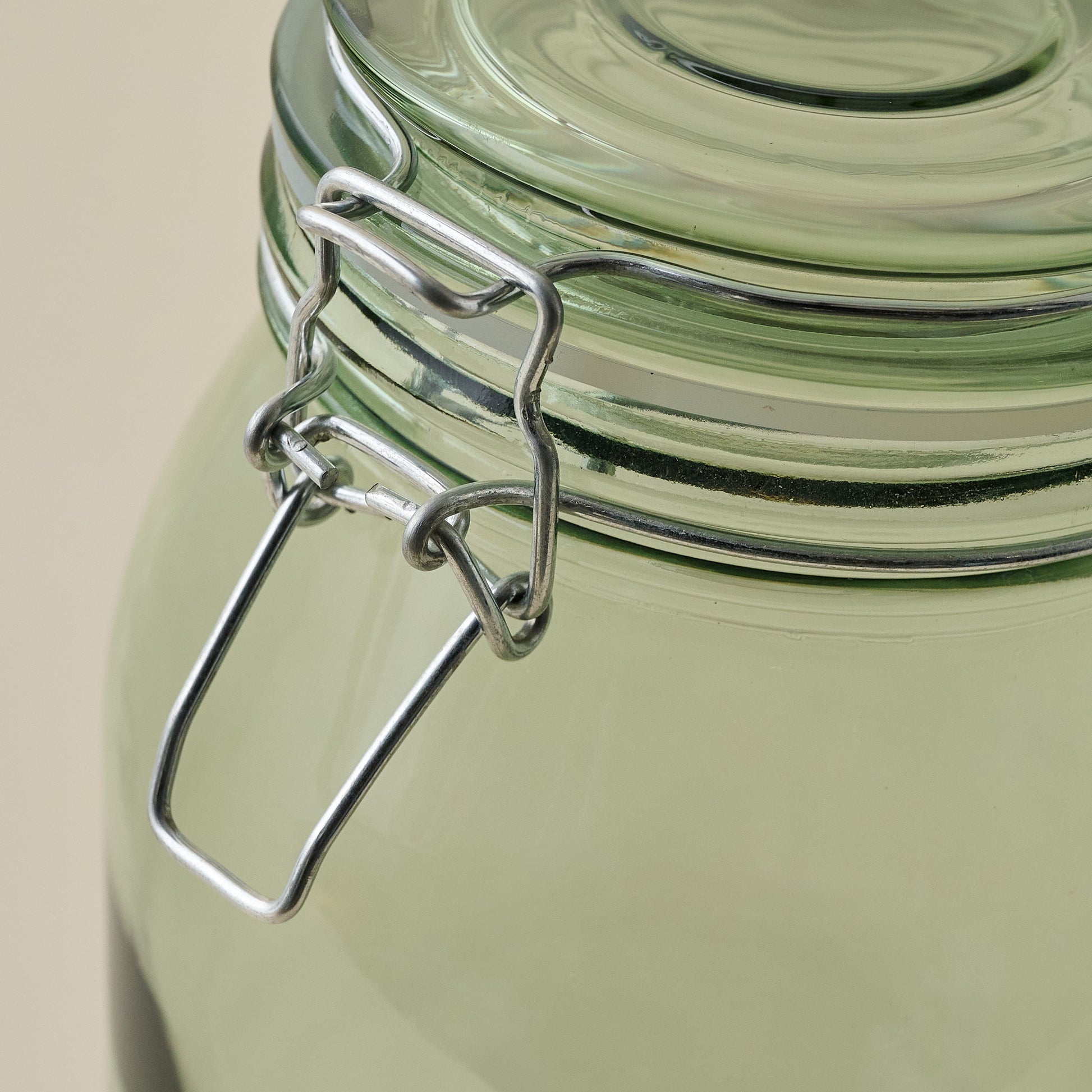 Magnolia Green Glass Storage Jar closure up close
