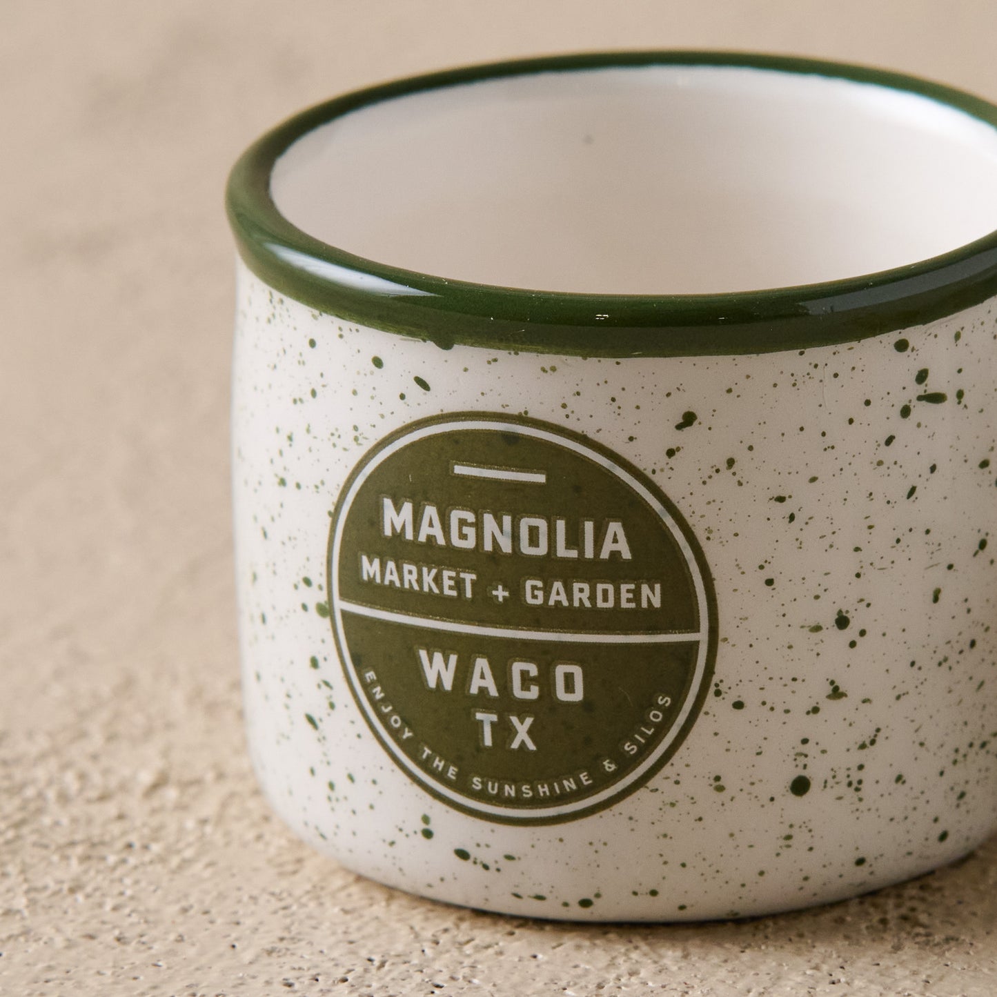 Green Magnolia Campfire Mug Ornament up close