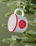 Red Magnolia Campfire Mug Ornament shown on tree