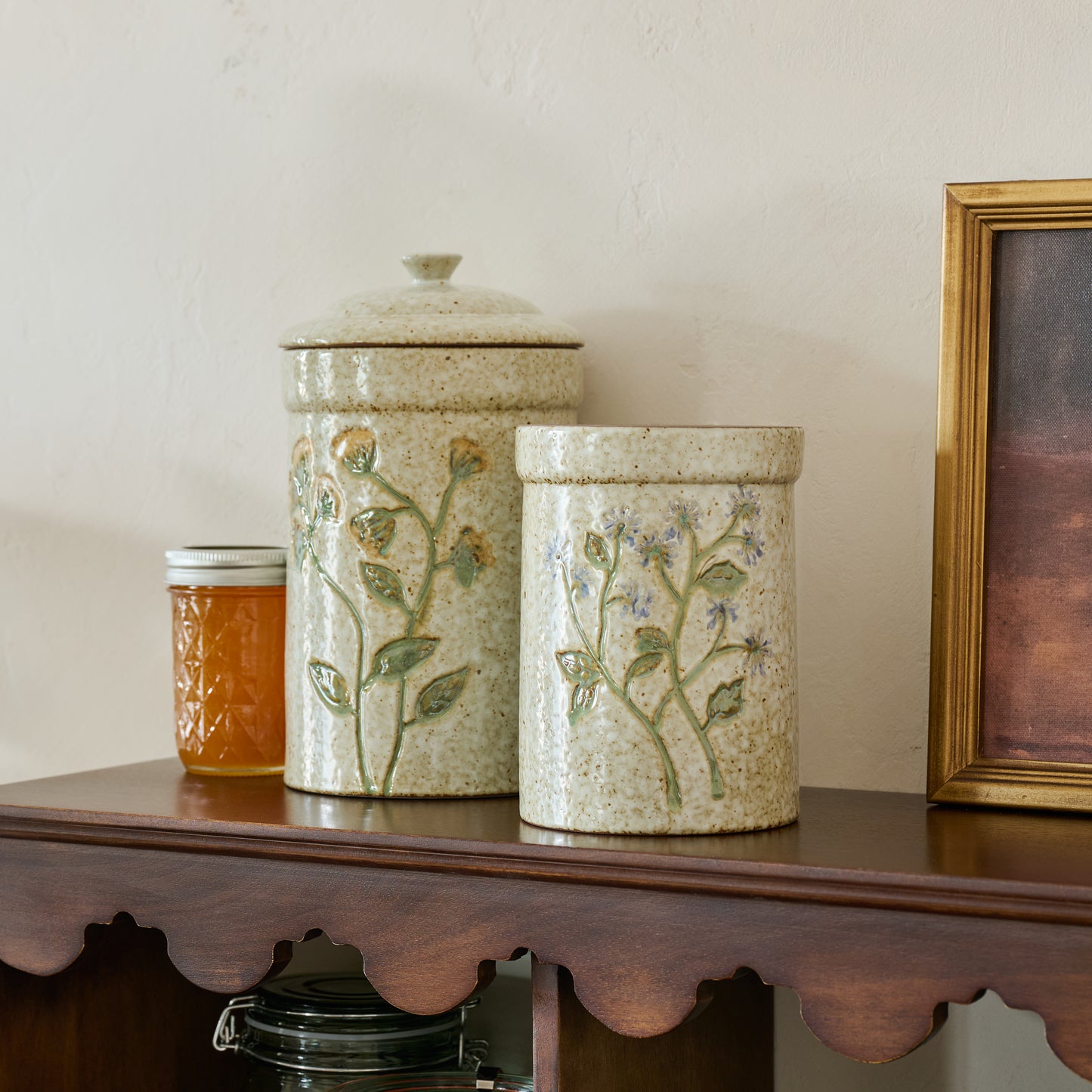 Blue Wildflower Canister shown with another canister on shelf