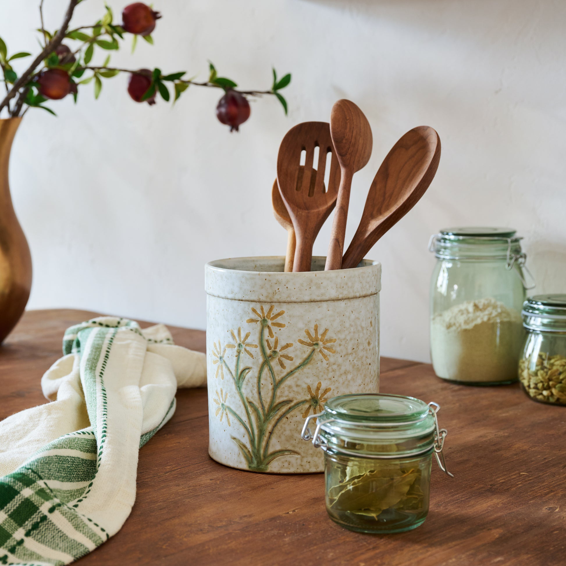 Wildflower Utensil Crock shown holding utensils