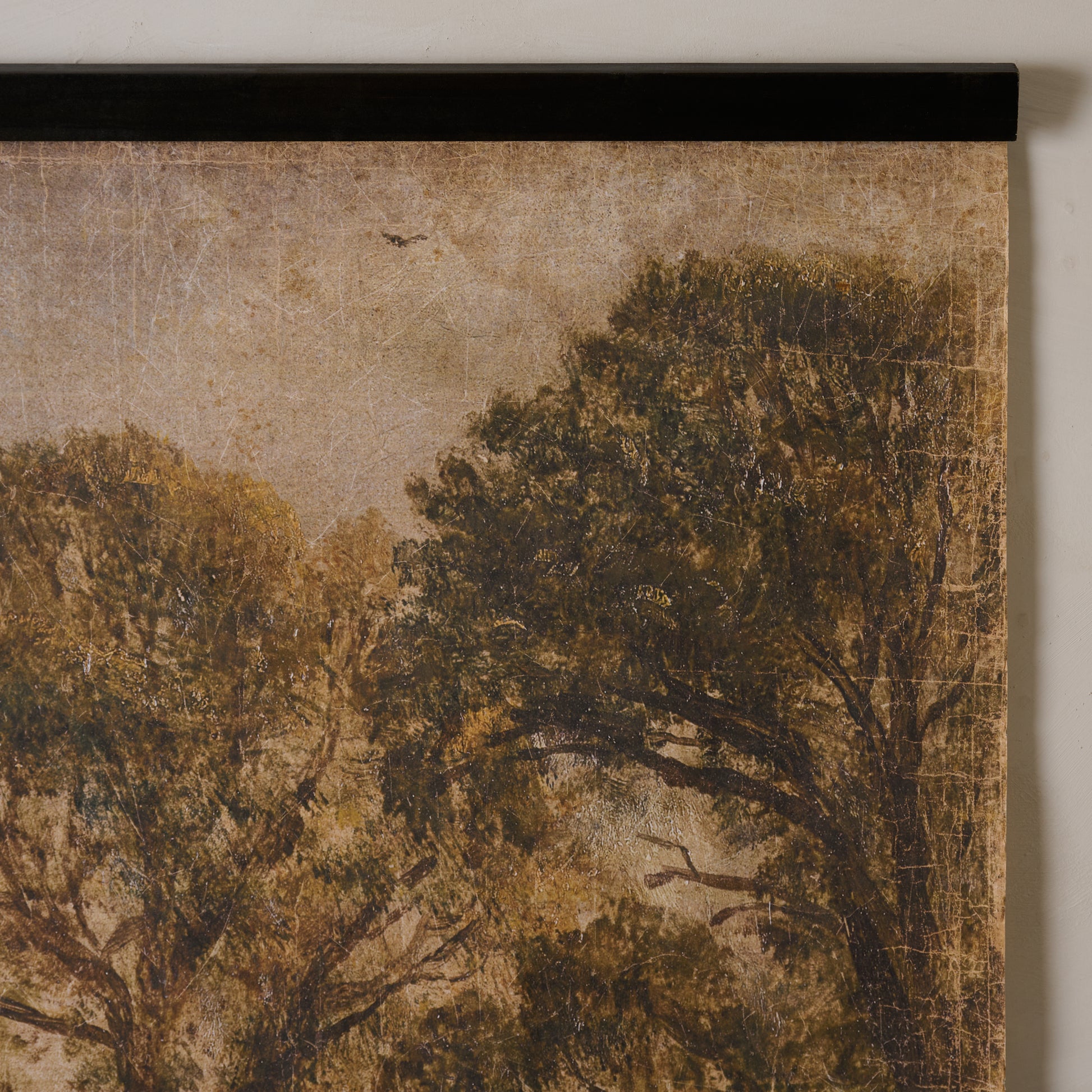 corner view of landscape tapestry with trees and open field