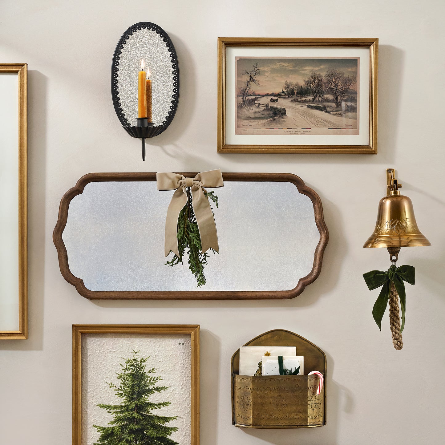 Etched Brass Wall Card Holder in a gallery wall