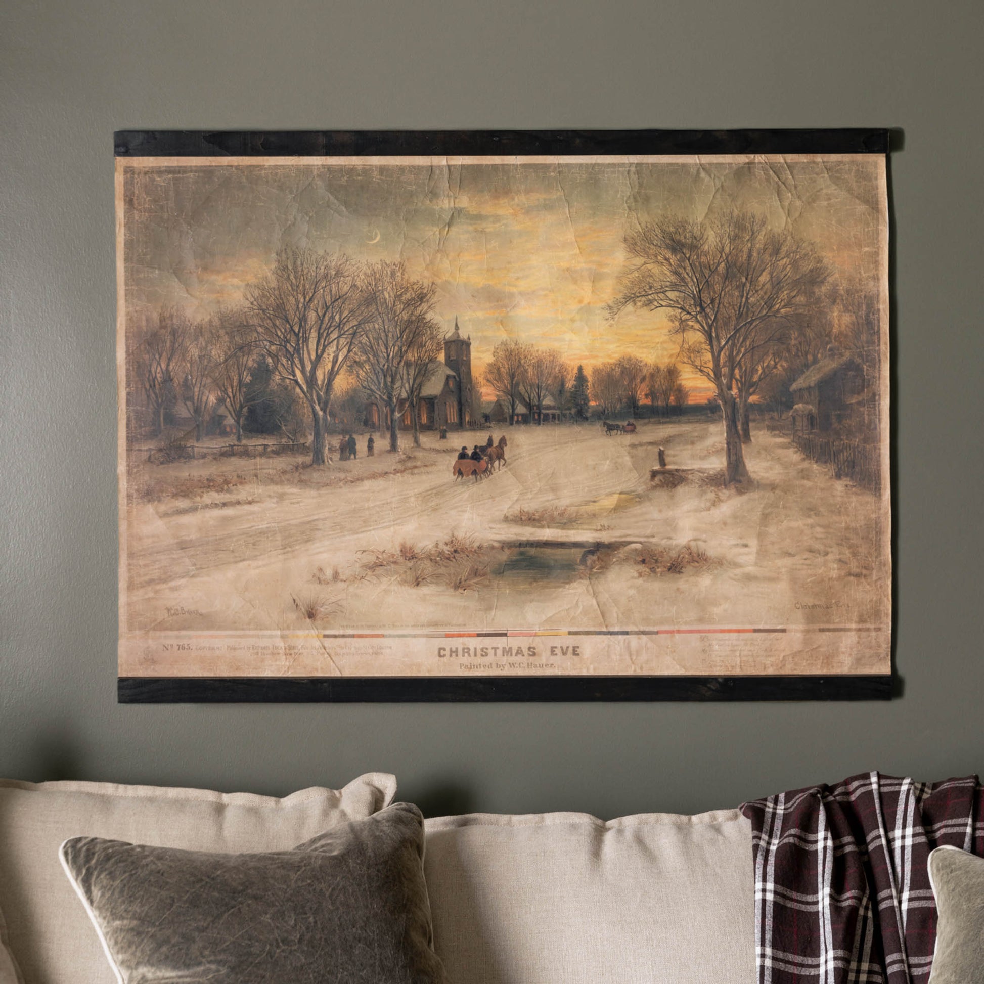 Vintage Christmas Eve Tapestry over a couch
