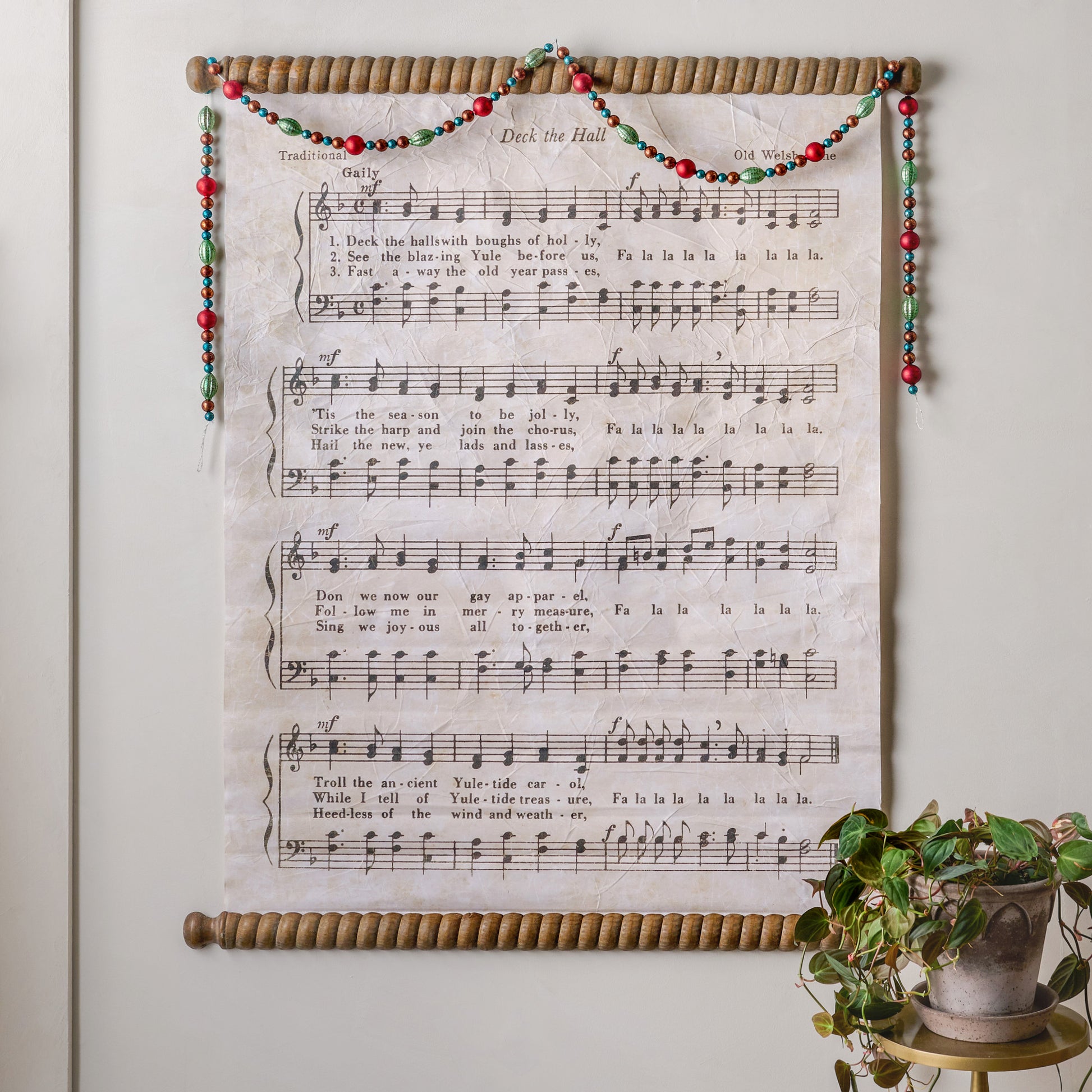 Vintage Deck the Halls Tapestry shown with garland