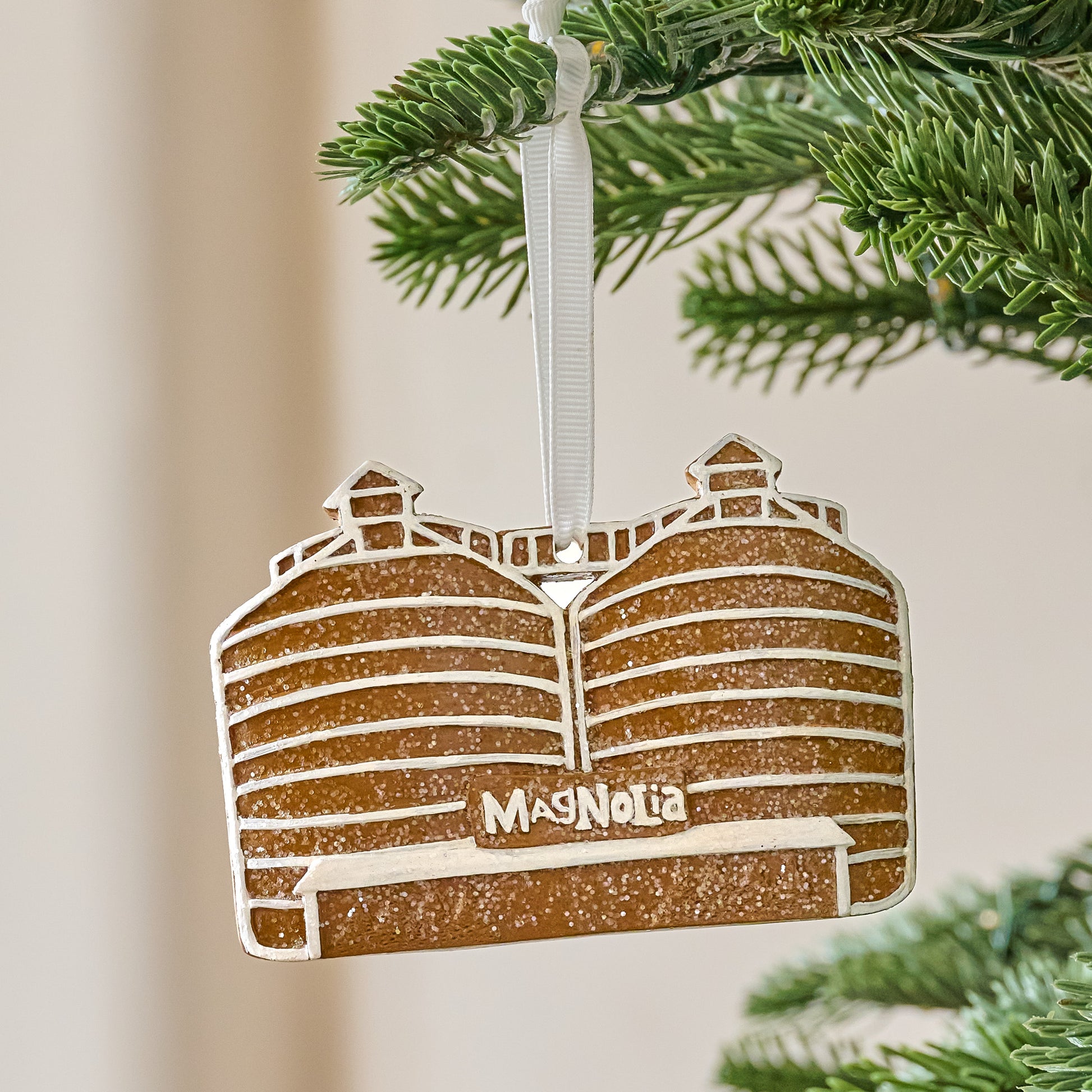Silos Gingerbread Ornament shown hung from tree
