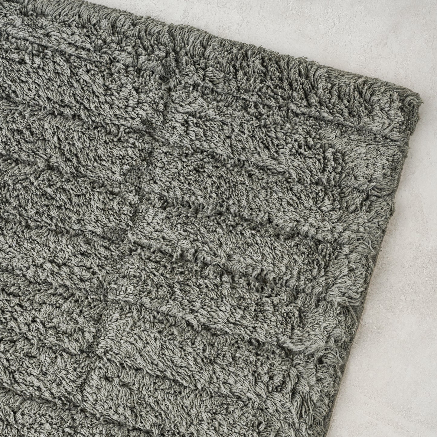 close up detail view of Olive Green Zone Bath Mat