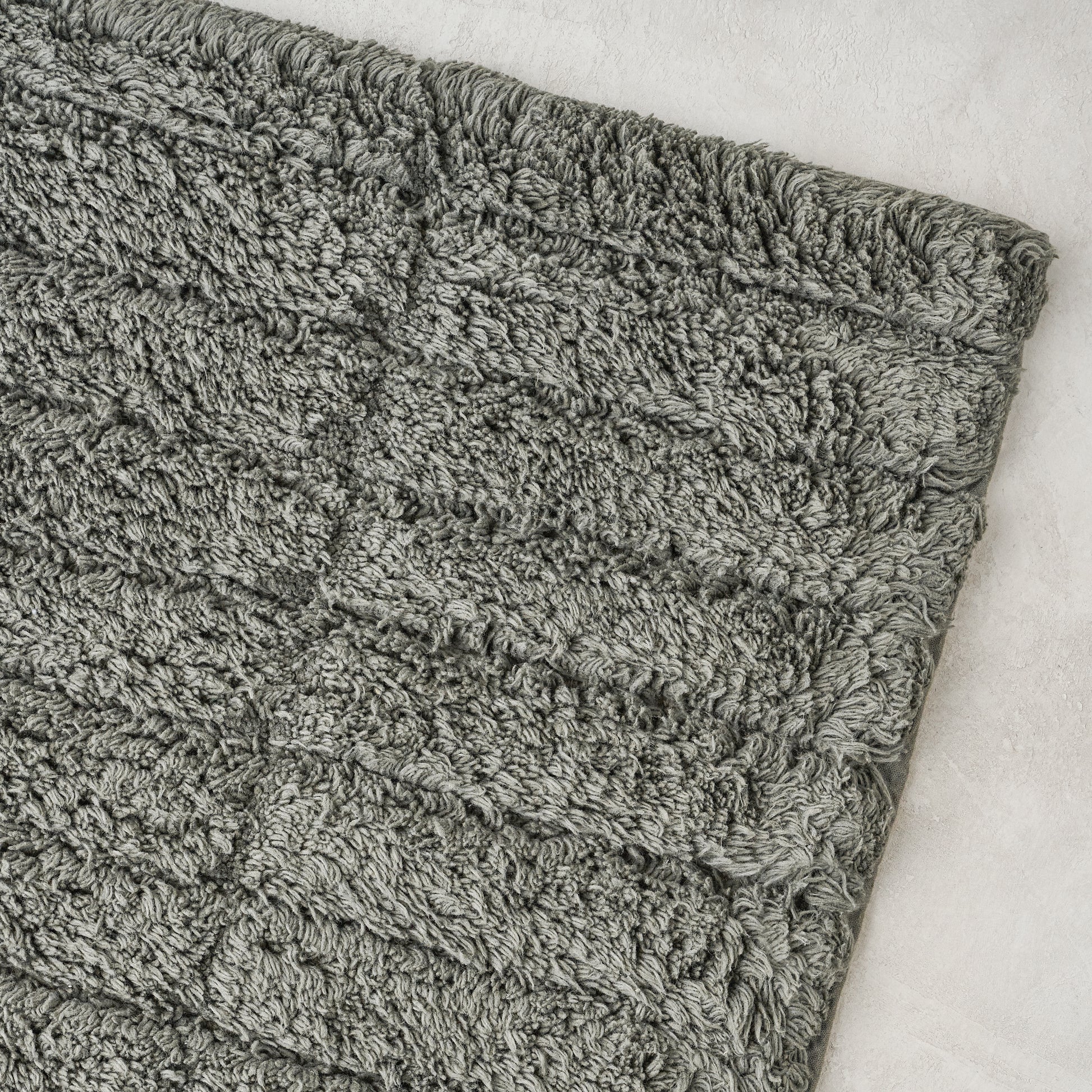 close up detail view of Olive Green Zone Bath Mat