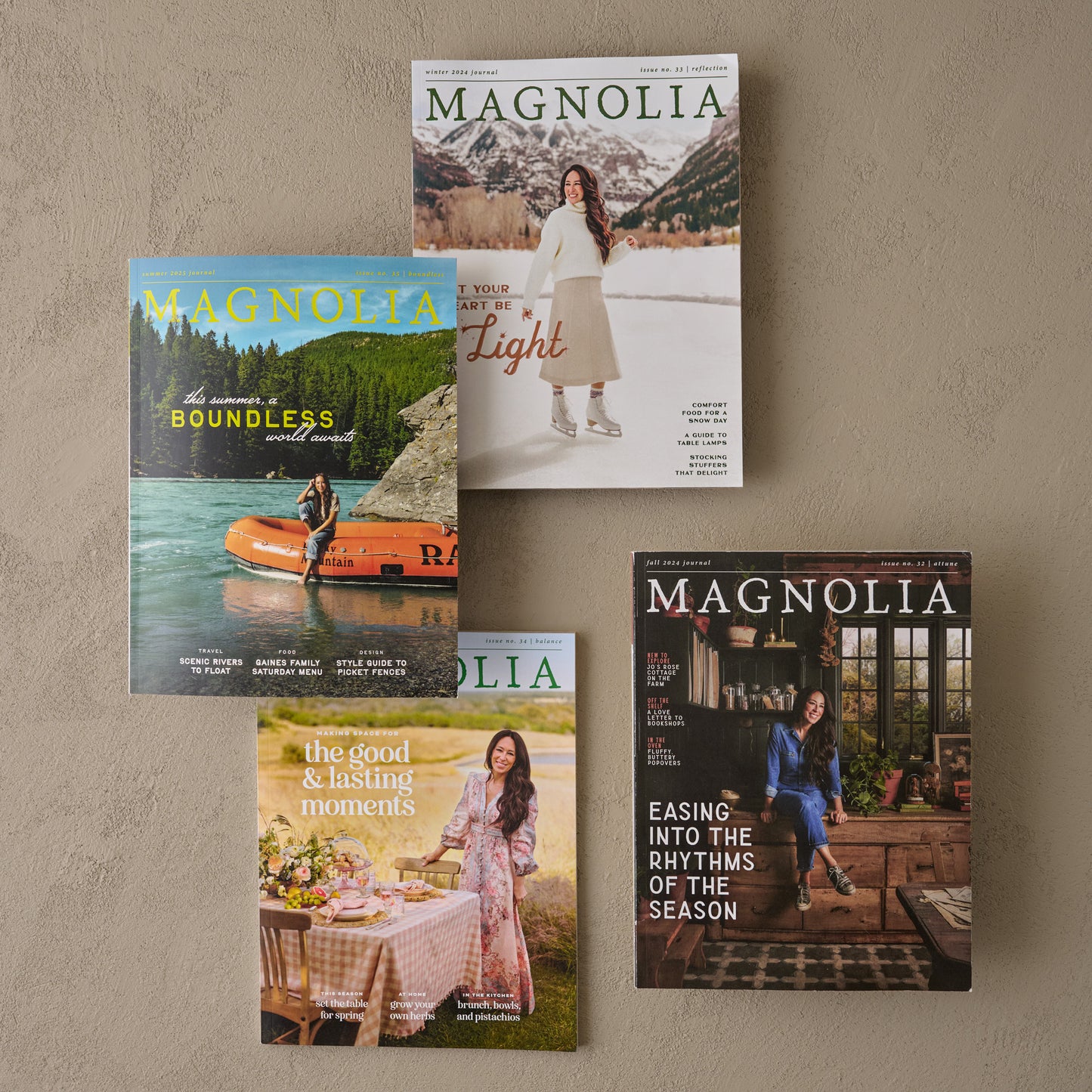 Magnolia Journal Summer 2025 shown with other issues