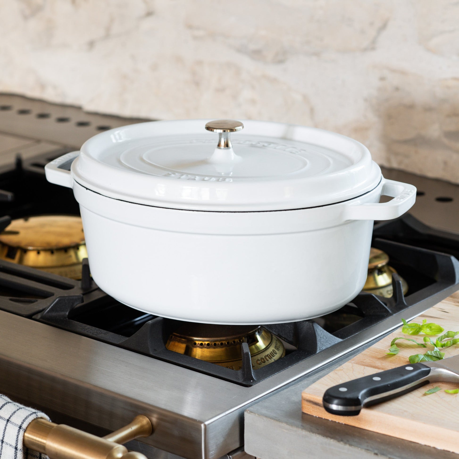 staub 7.25 quart enameled cast iron oval dutch oven in white