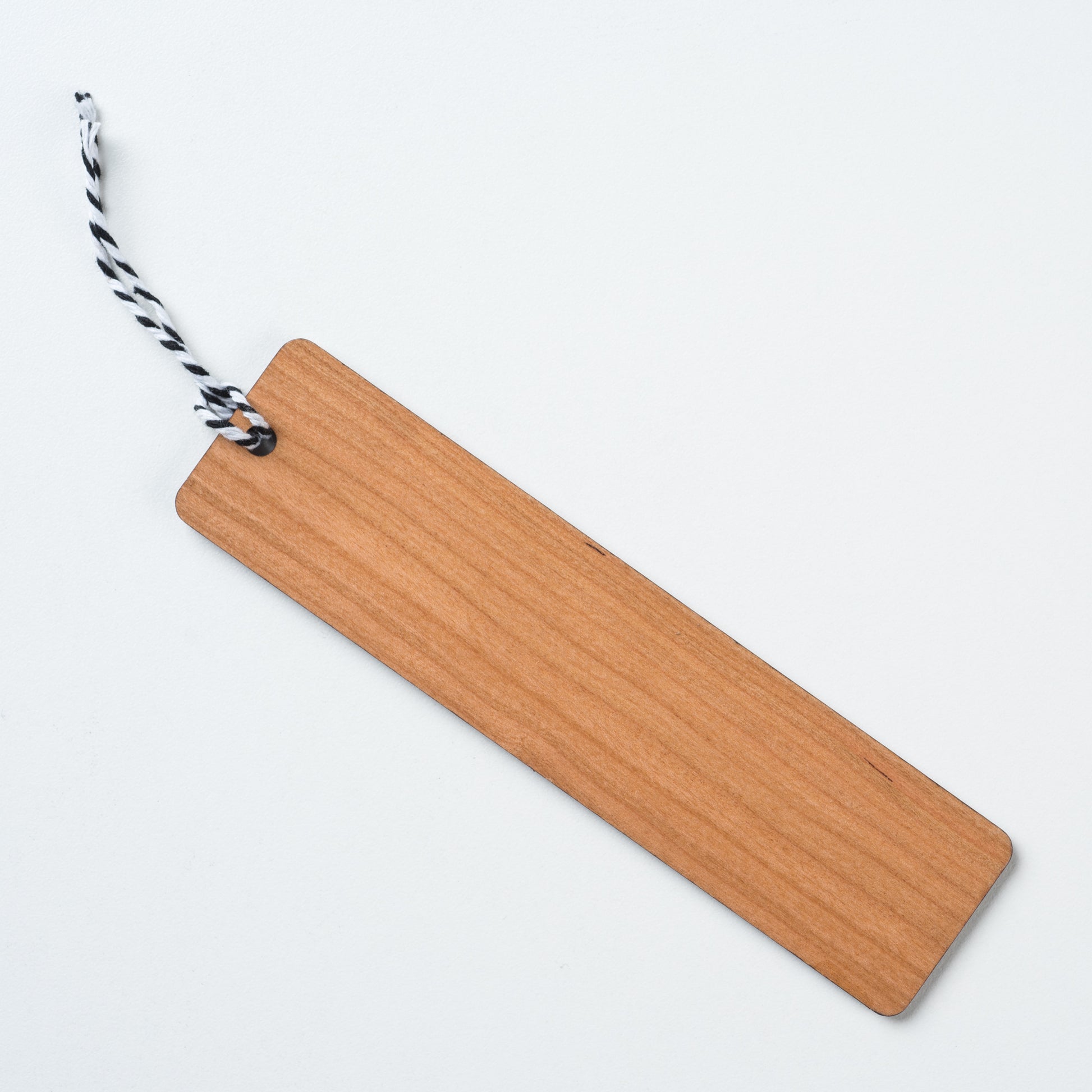 wooden bookmark with magnolia logo