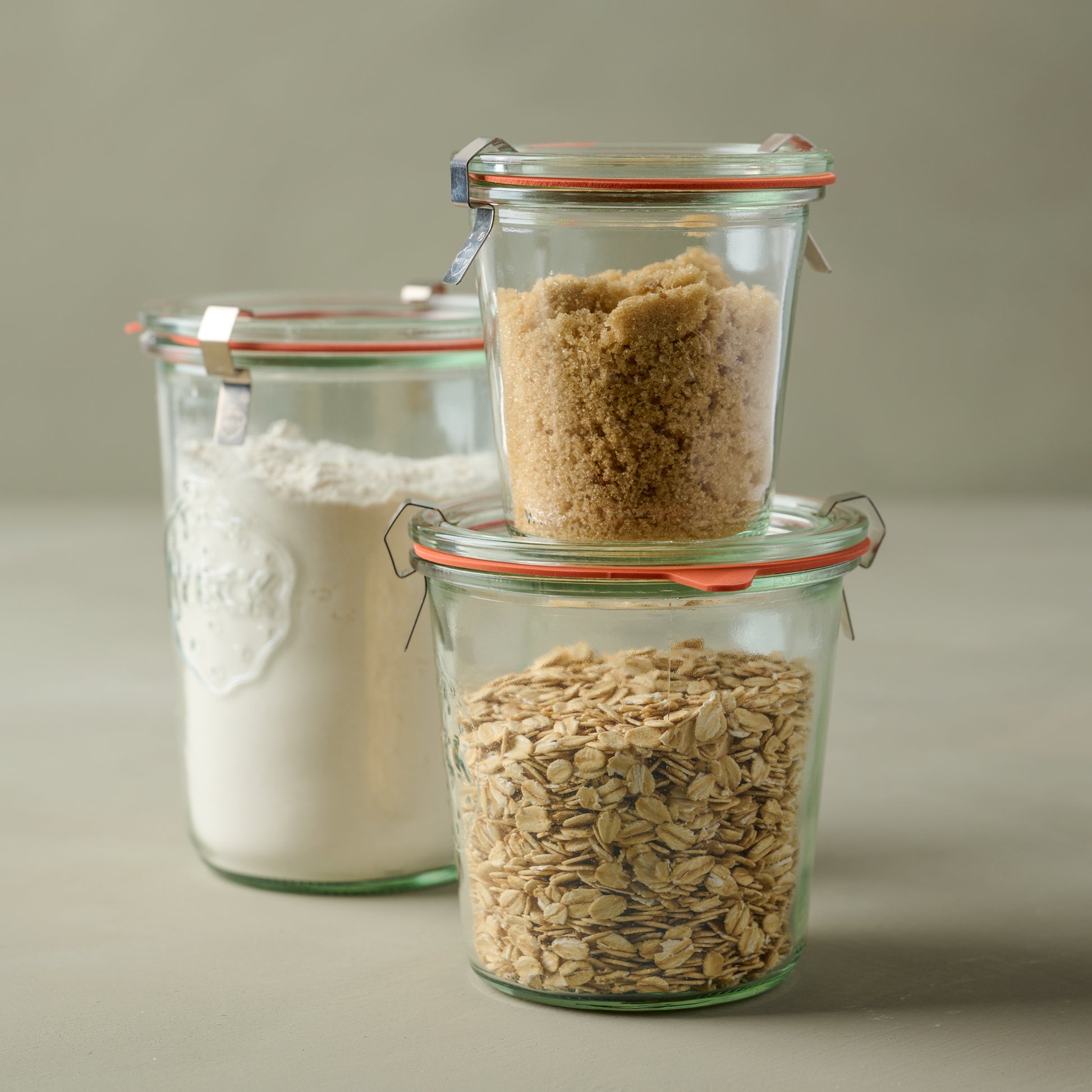 Weck 900 1/5 L Mold Jar on top of and next to two other sized Weck jars. used for canning