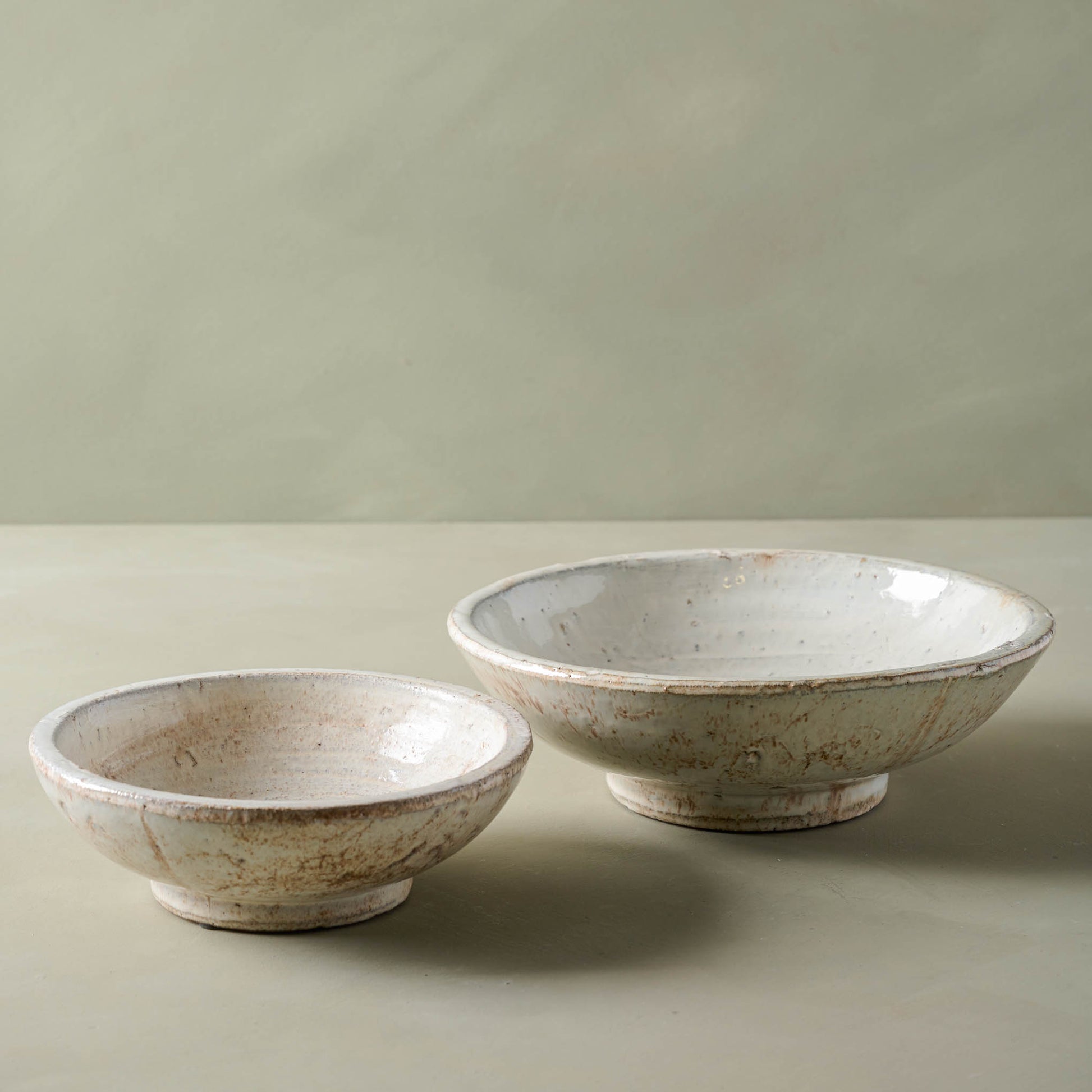 Large and small sizes of rustic cream accent bowl