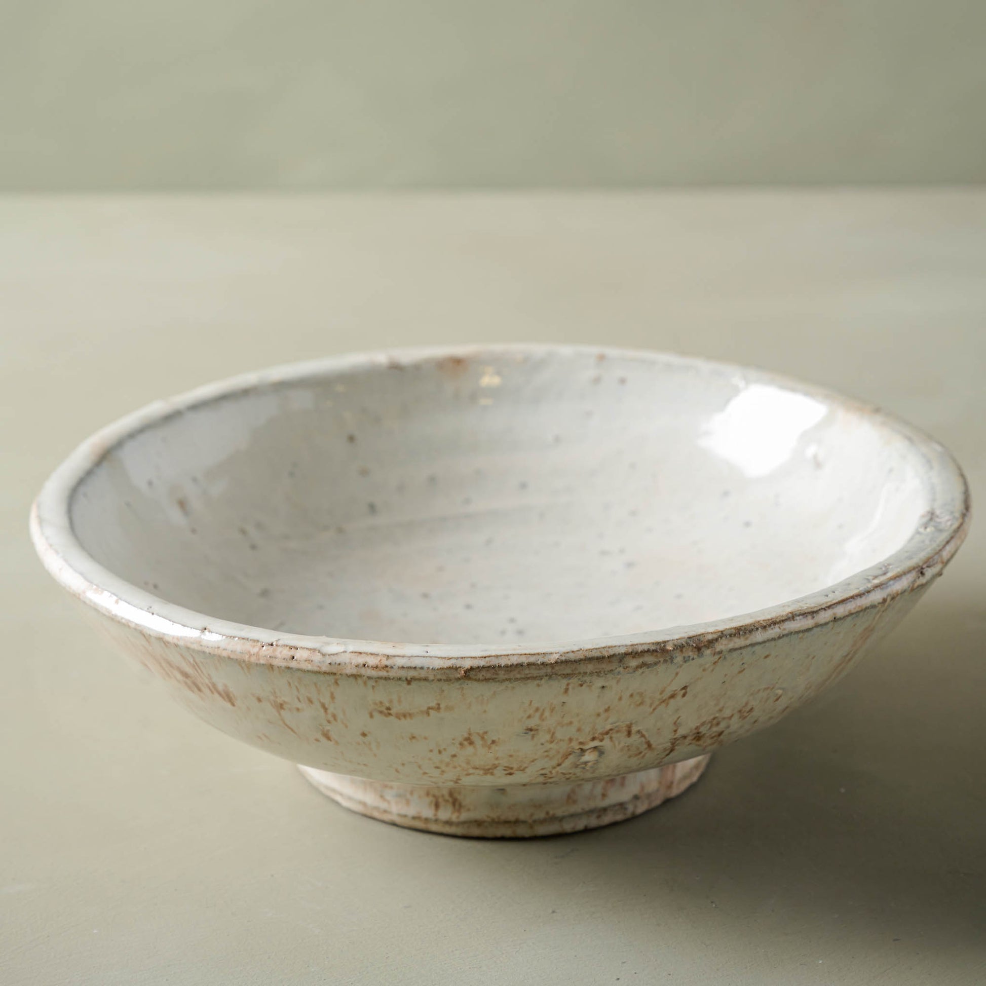 Rustic cream accent bowl in large size.
