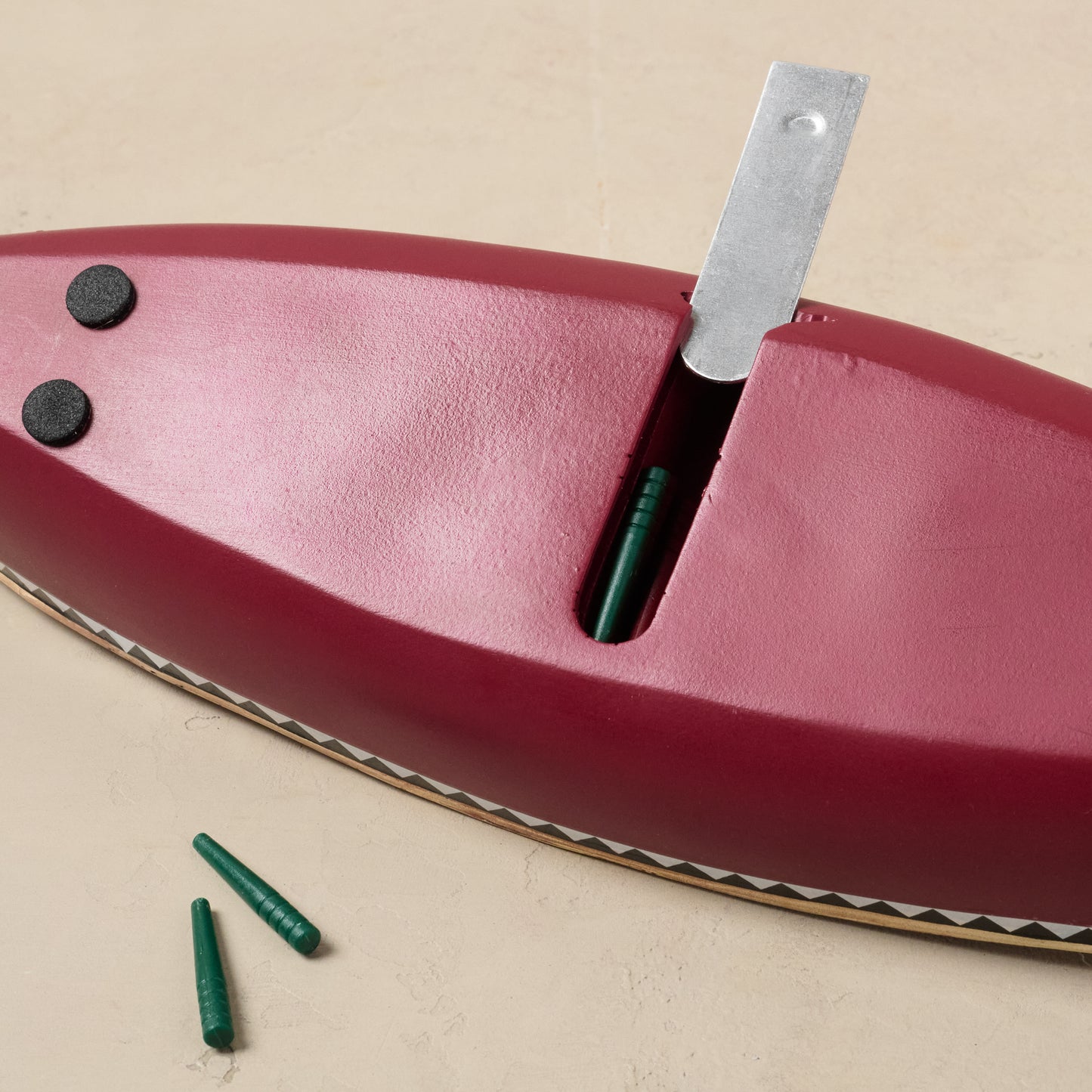 Canoe Cribbage Board underneath shows storage for game pieces