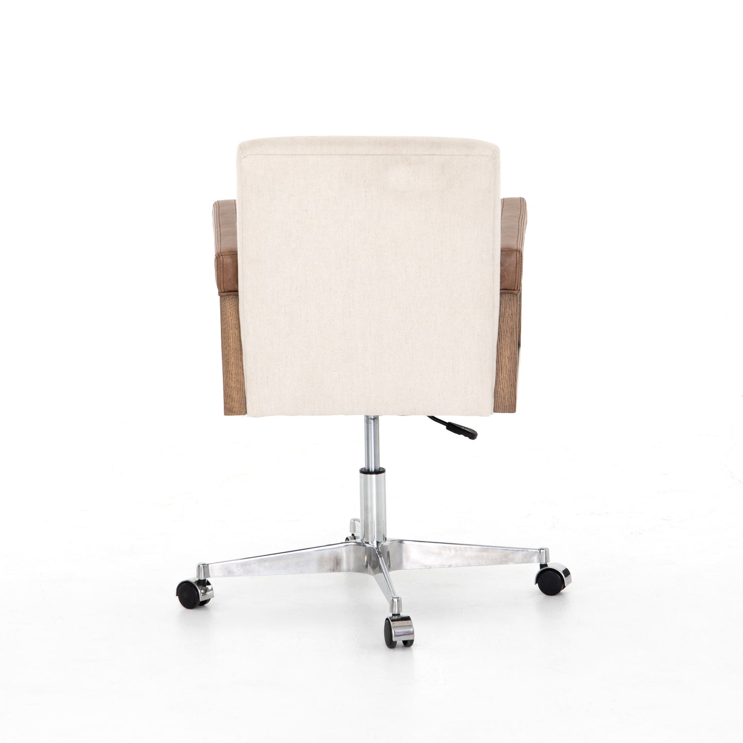 cream linen desk chair with leather-wrapped wooden arms and chrome metal base with wheels