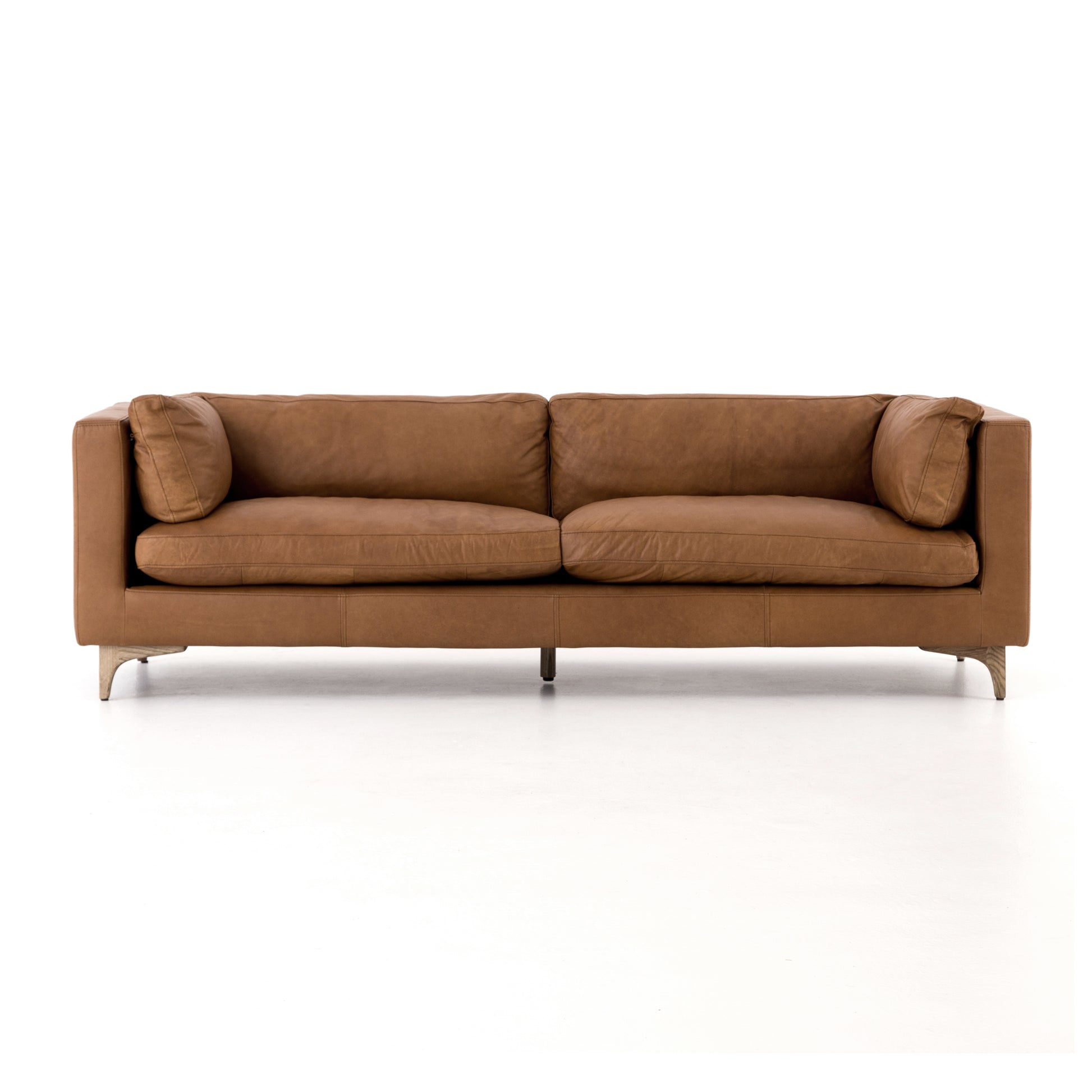 modern brown leather sofa with wooden legs