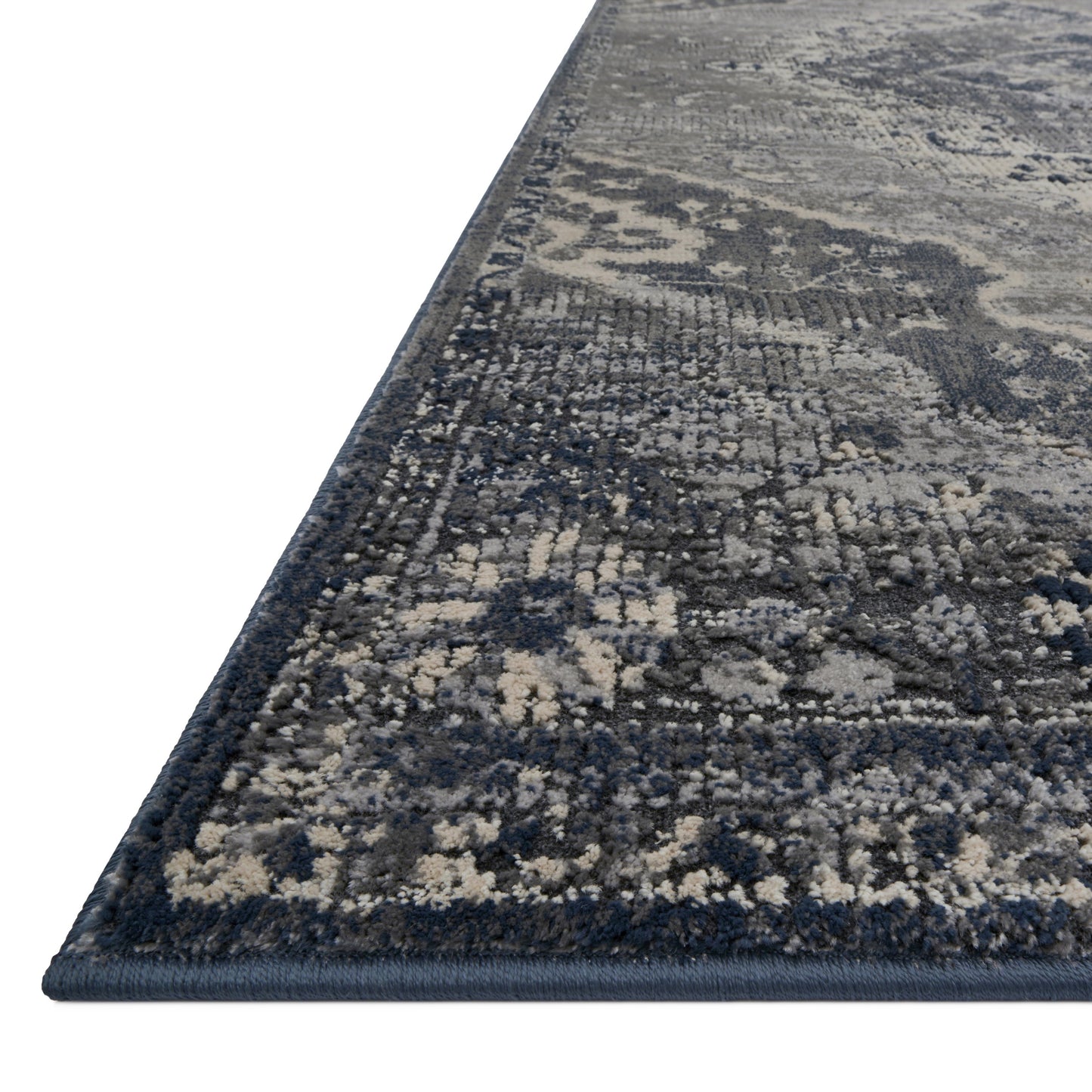dark grey and silver rug with traditional pattern