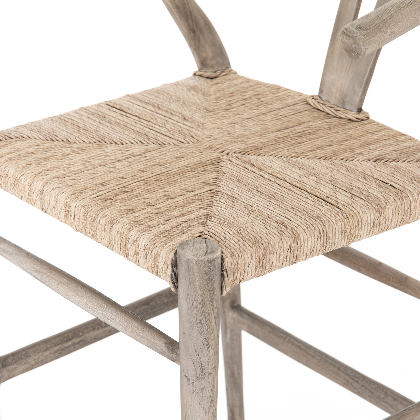 weathered grey wooden counter stool with curved back and woven seagrass seat