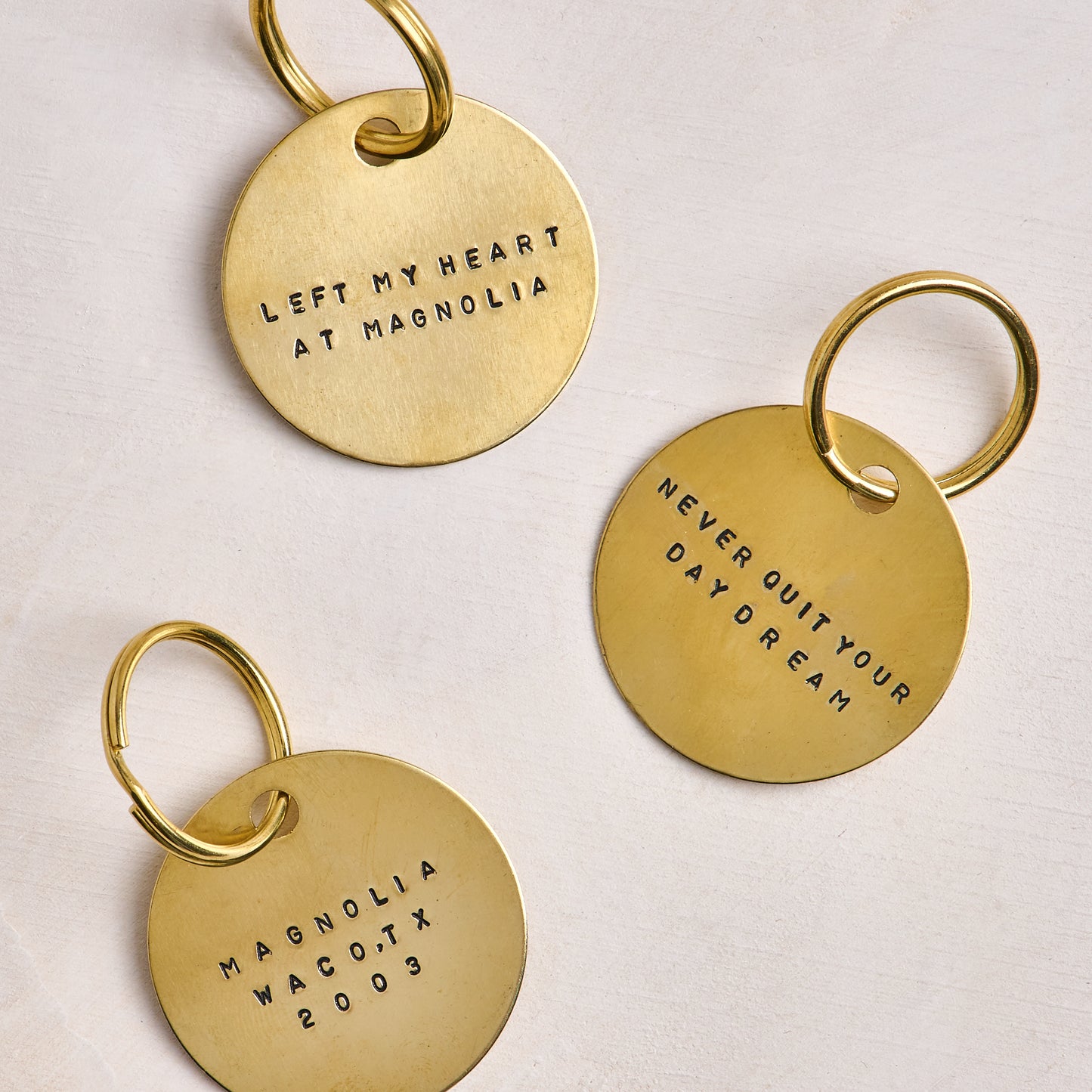 Never Quit Your Daydream Brass Keychain