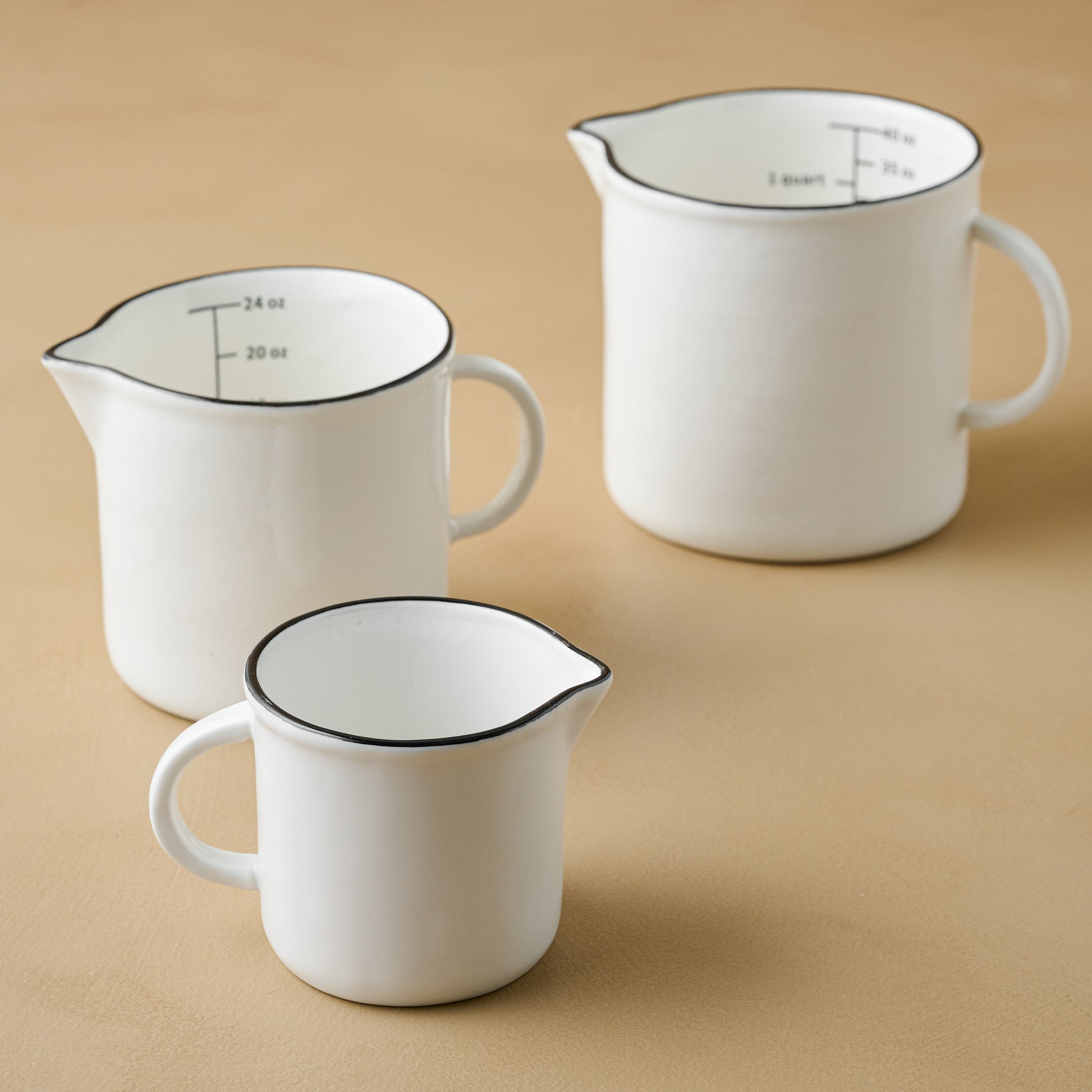 Magnolia Black Rim Measuring Pitcher in three sizes
