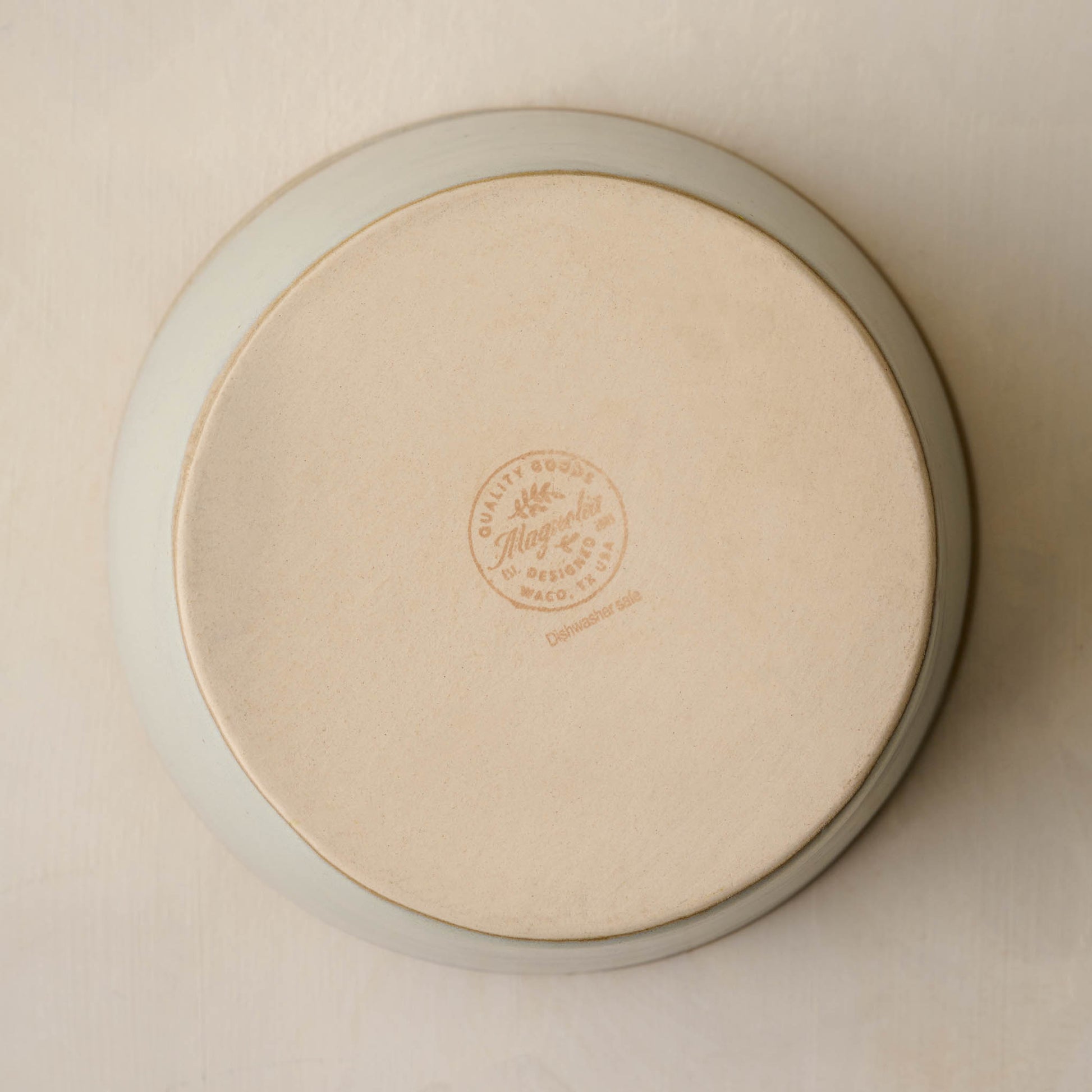 magnolia logo on the bottom