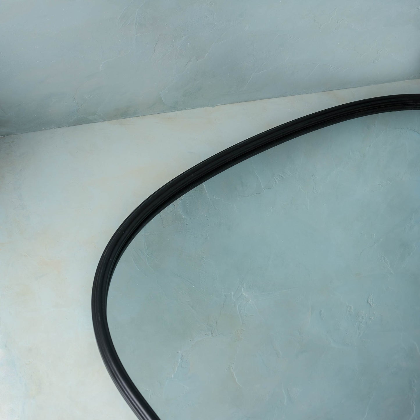 close up view of arched top on Archer Metal Framed Mirror
