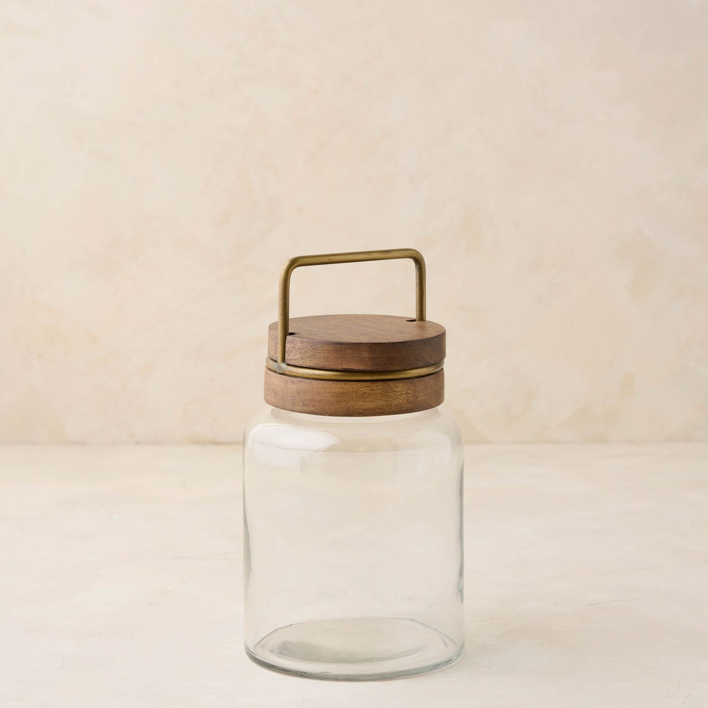 magnolia glass canister with wood and antique brass lid