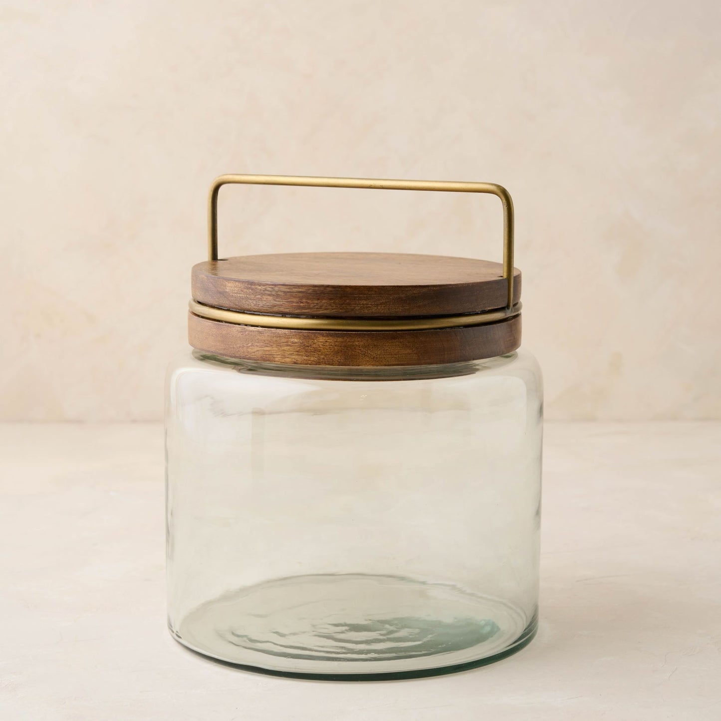 magnolia glass canister with wood and antique brass lid