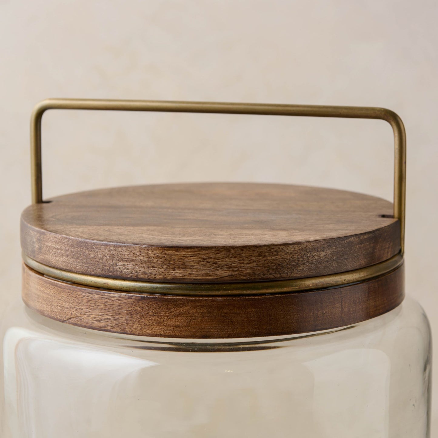 magnolia glass canister with wood and antique brass lid