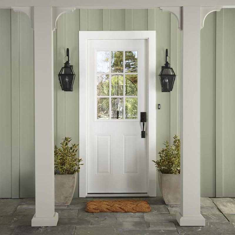 Muted apple green with gray accents exterior paint
