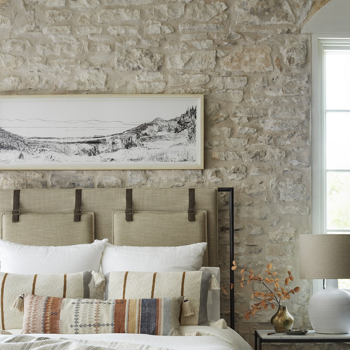 landscape sketch of mountains and valley in an off-white frame with small white mat