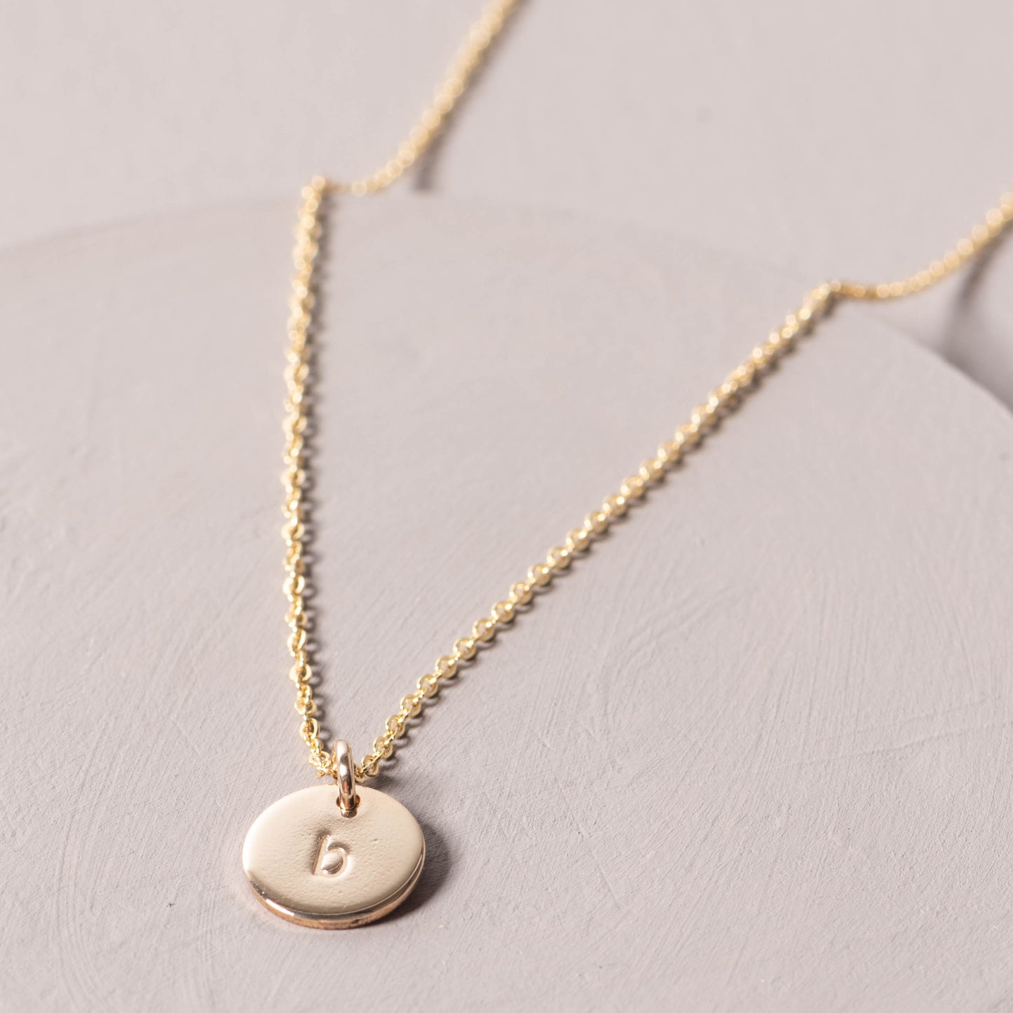 magnolia gold initial disc necklace