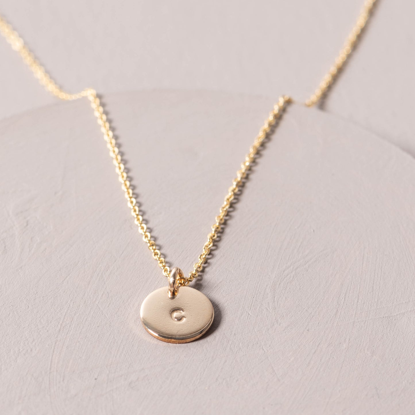 magnolia gold initial disc necklace