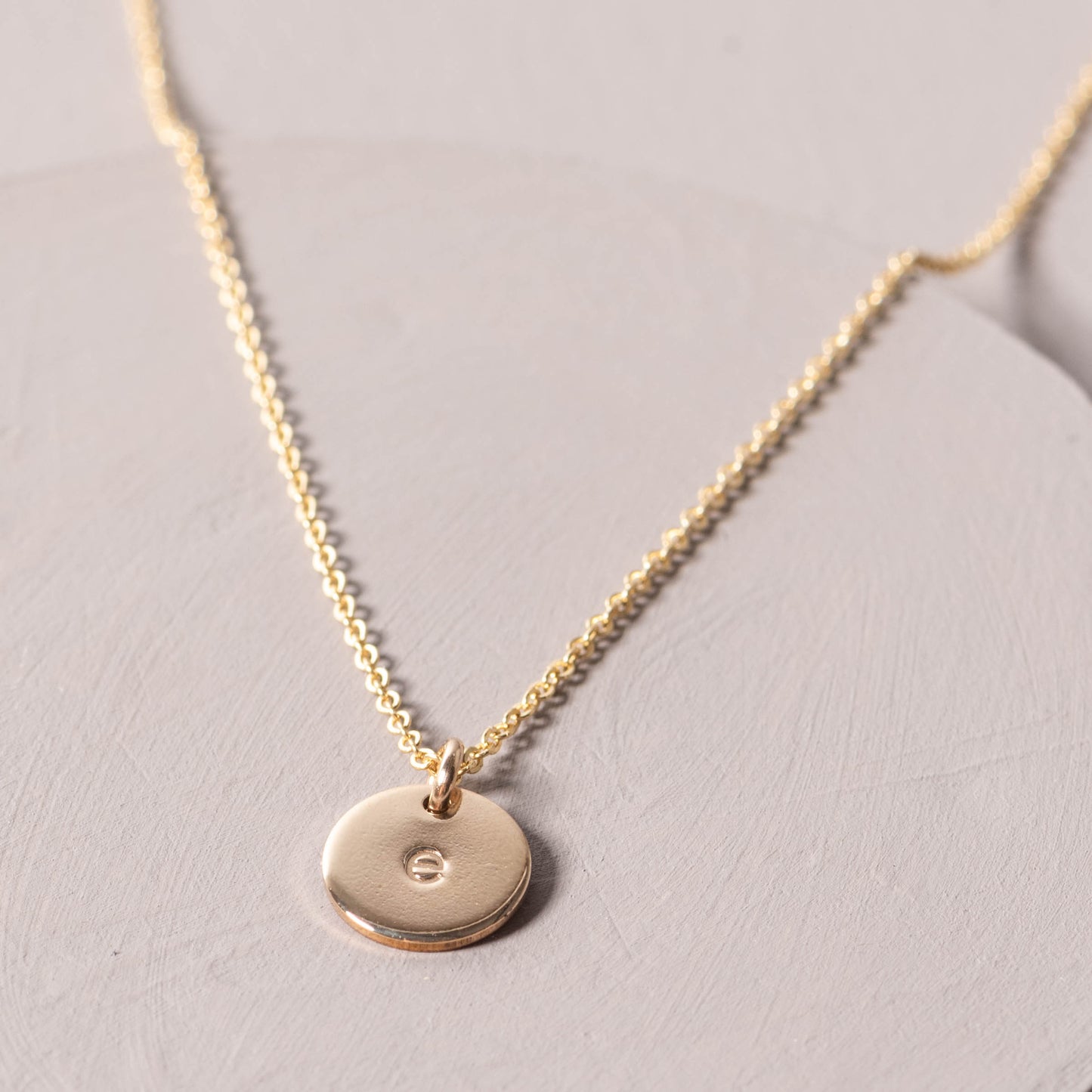 magnolia gold initial disc necklace