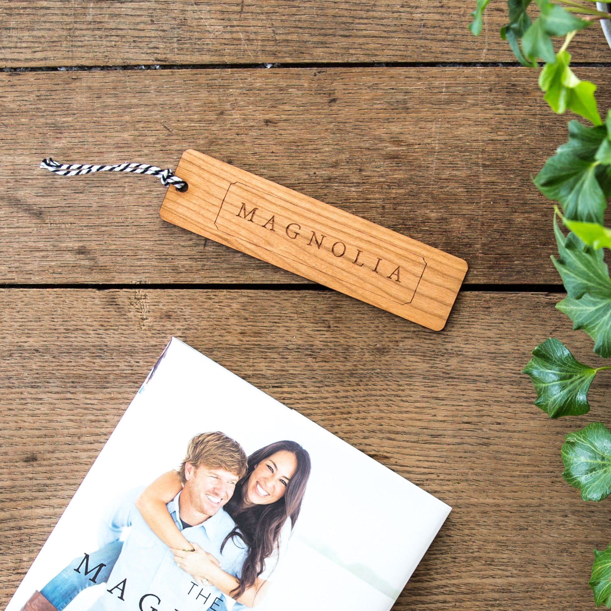 wooden bookmark with magnolia logo