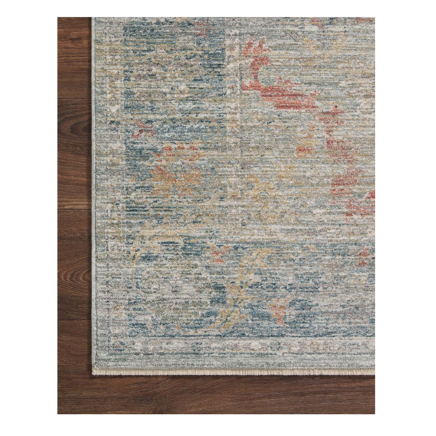 Millie Slate Multi Rug corner on wood floor
