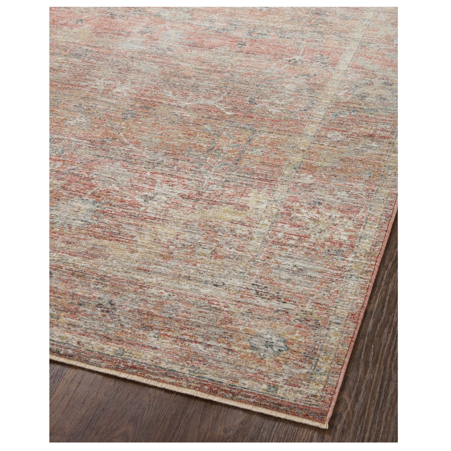 Millie Sunset Multi Rug corner on wood floor