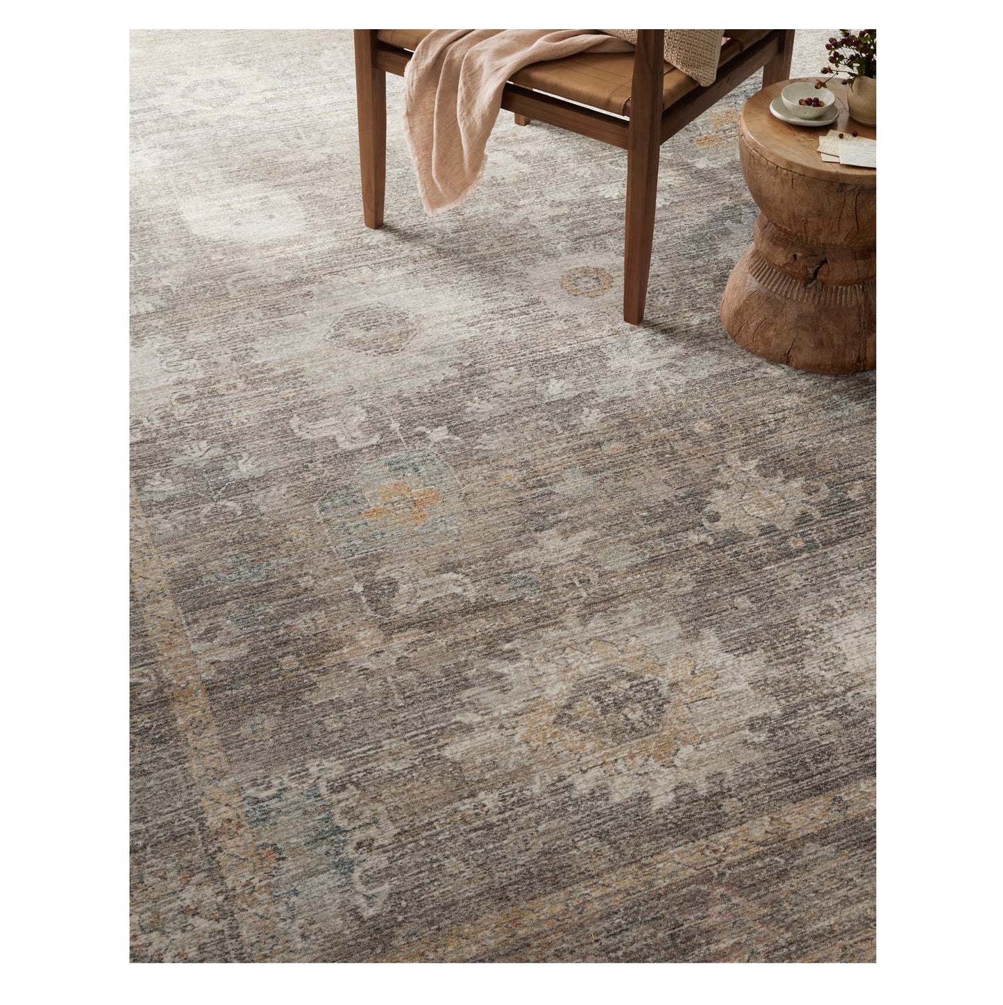 Millie Stone Natural Rug under chair