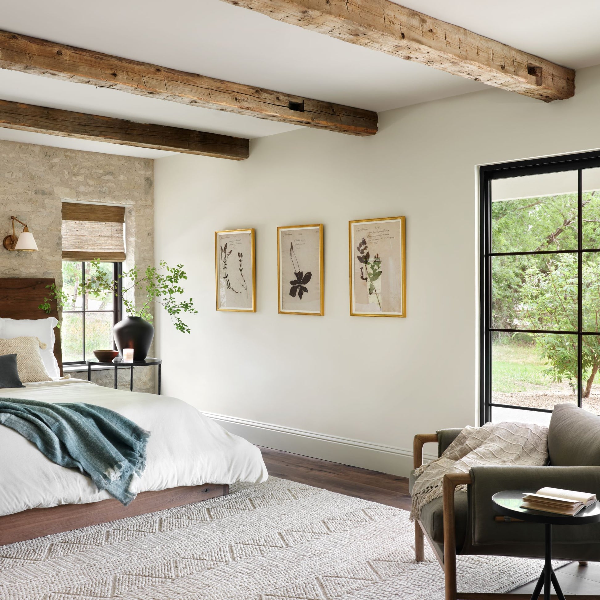 collection of three pressed floral wall art prints hanging on wall