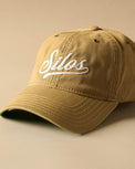 Silos Distressed Baseball Hat - front of hat reads silos in script