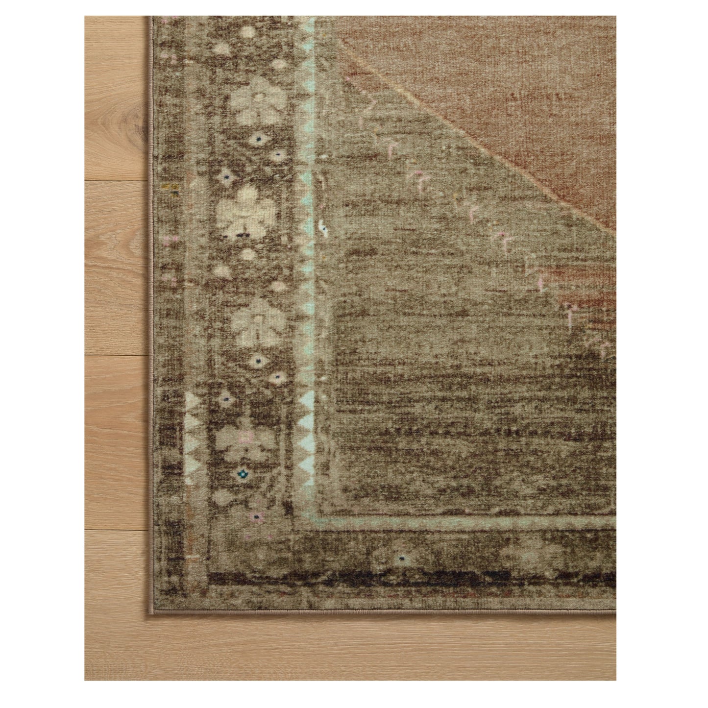 Sinclair Clay Tobacco Rug corner on wood floor