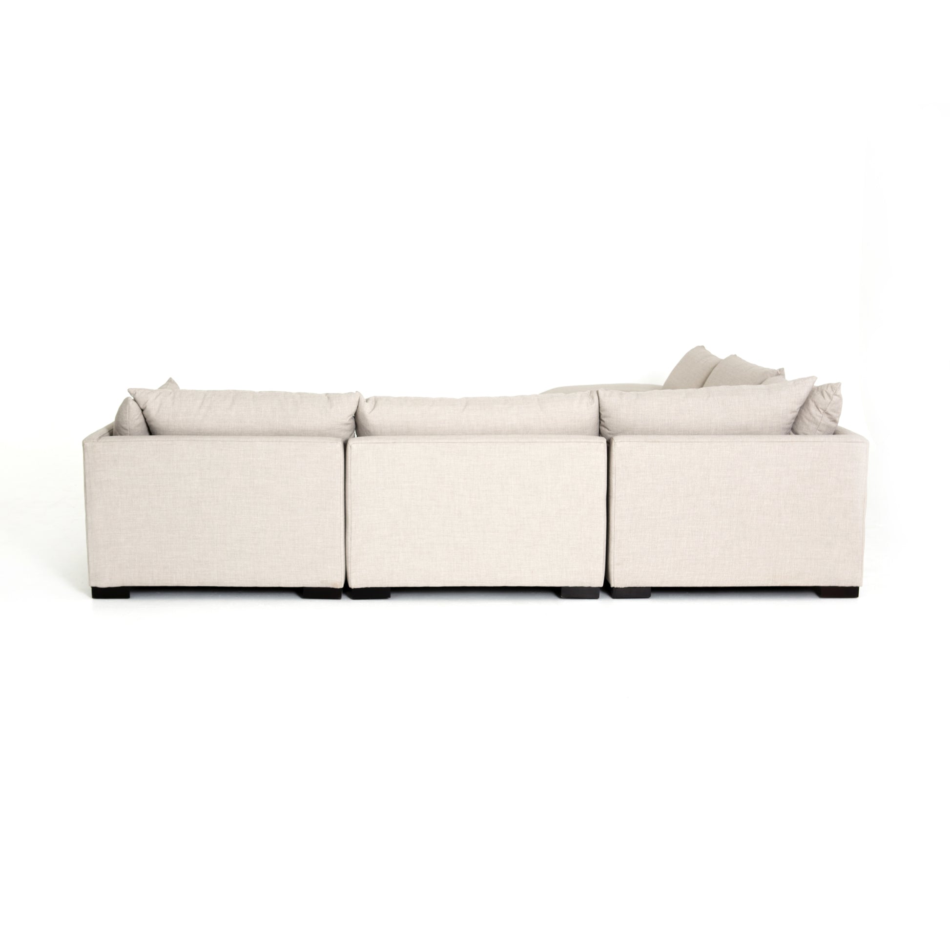 cream fabric L-shaped sectional sofa with ottoman for magnolia