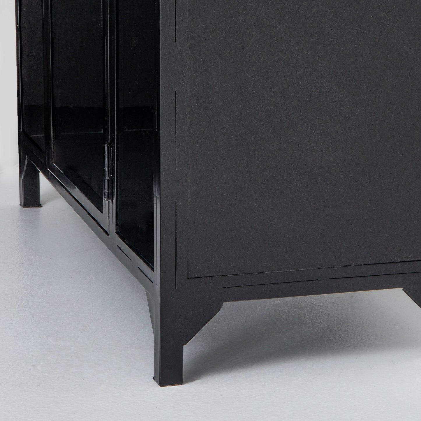 large black metal cabinet with rounded top